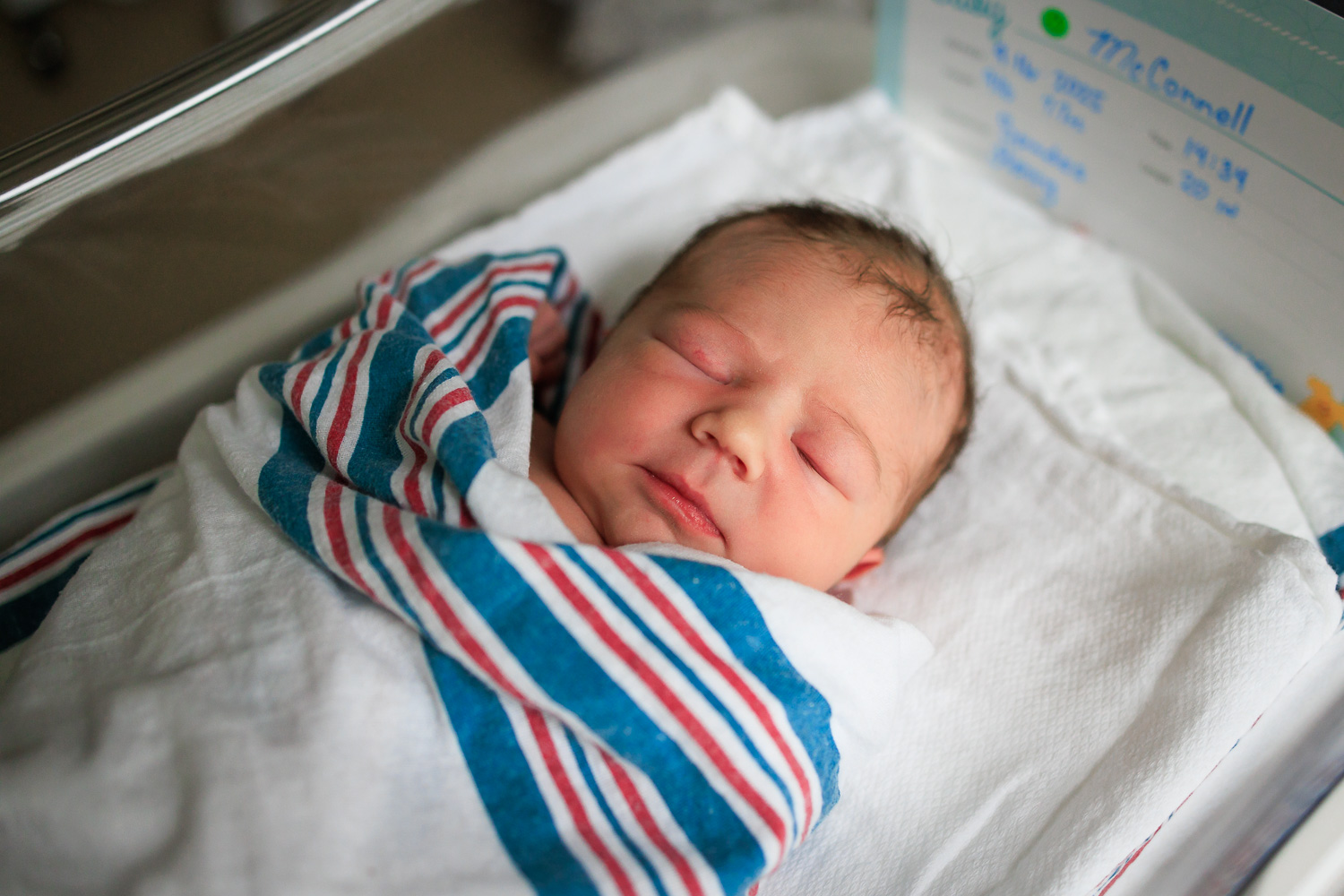 Hospital newborn photos of baby boy.